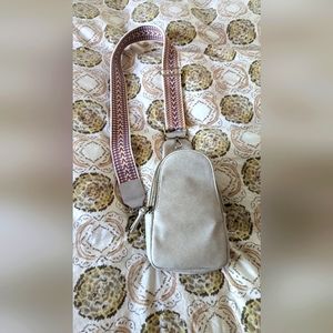 Anthropologie sling purse.